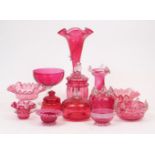 Thirteen pieces of Victorian cranberry glass, to include a trumpet epergne, 29cm high, and