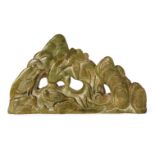 A Chinese green hardstone 'ducks and mountains' brush rest, late Qing dynasty, carved with ducks and