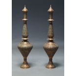 A pair of large North Indian standing openwork copper vases with covers, 20th Century, decorated