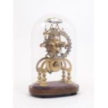 A brass skeleton clock, mid-20th century, the silvered chapter ring set with Roman numerals, the