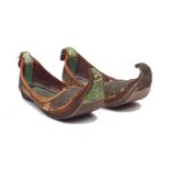 A pair of embroidered leather Eastern slippers or shoes, 30cm long (2) Provenance: Private