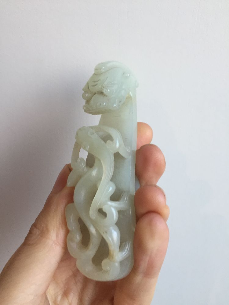 A Chinese pale green jade dragon belt hook, 18th century, carved with a dragon head terminal and a - Image 4 of 11