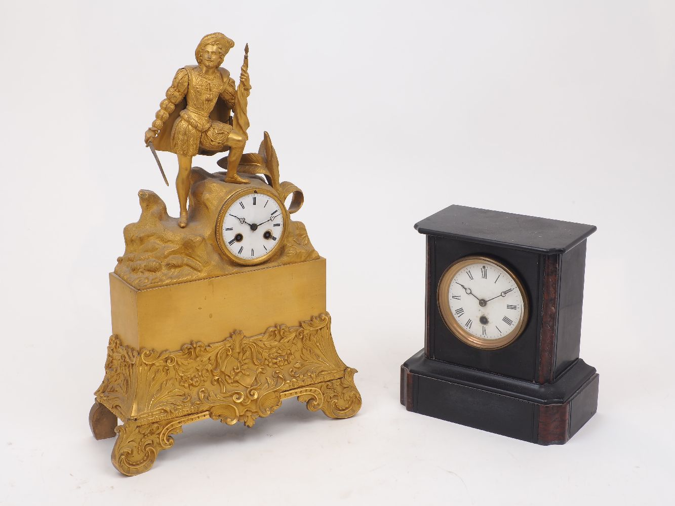 A French gilt metal mantle clock, 19th Century, modelled in the form of an explorer with sword drawn