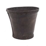 A leather fire bucket, 19th century, of studded panel construction, 26cm highPlease refer to