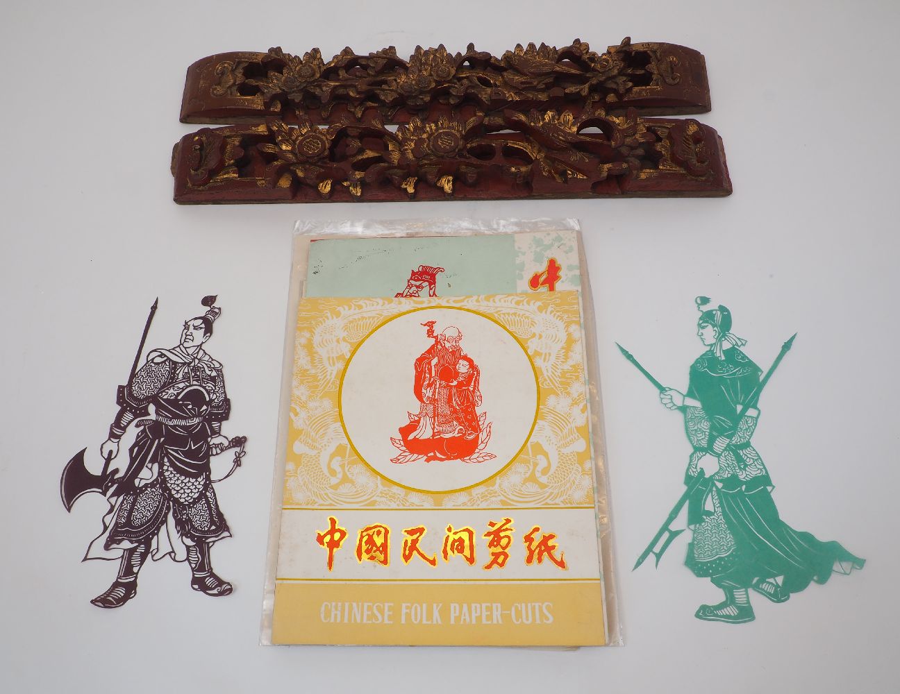 A collection of Chinese folk paper-cuts, mid 20th century, to include depictions of Chou Lao,