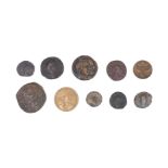 An academic collection of Roman coins, including a silver denarius of Vespasian, the obverse with