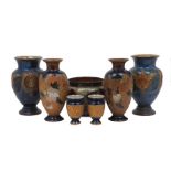 Three pairs of Royal Doulton vases, 20th century, comprising: a pair with portrait medallions,