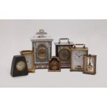 A group of seven mantle and carriage clocks and timepieces, 20th century, including: a German