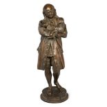 An American gilt spelter figure of Benjamin Franklin, early 20th century, modelled standing with