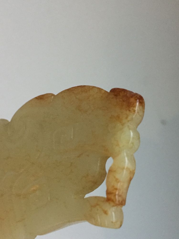 A rare Chinese yellow jade pendant, Western Zhou dynasty, carved as a stylised mythical beast with a - Image 8 of 11