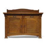 Arts & Crafts, an oak and inlaid sideboard c.1900, applied label to reverse - 'Hull, Loosley &