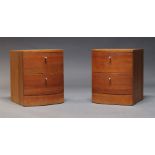 A pair of modern bedside chests, of recent manufacture, of bowfront form, each with two drawers,
