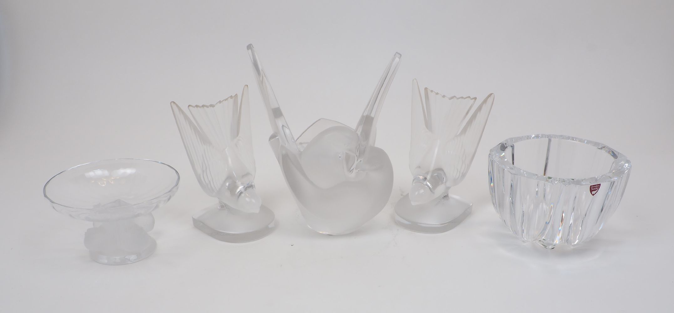 A group of modern glass, late 20th century to include; Lalique 'Hirondelle' bookends originally