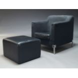 A modern lounge chair, mid to late 20th Century, with charcoal fabric upholstery and black