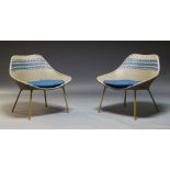 A pair of contemporary garden seats, of recent manufacture, the woven faux rattan seats with loose