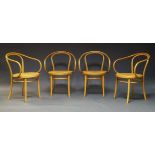A group of Thonet style beech and caned bentwood furniture, comprising four '209' style chairs by