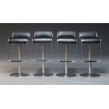 After Shin & Tomoko Azumi, a set of four adjustable bar stools, with black leather seats, on