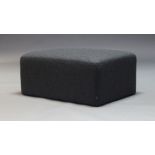 Hem, a 'Bon Pouf Brick' pouf, of recent manufacture, upholstered in dark grey fabric, 38cm high,