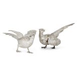 A pair of silver pheasants, London, c.1972, Albion Craft Co., modelled in naturalistic poses, the