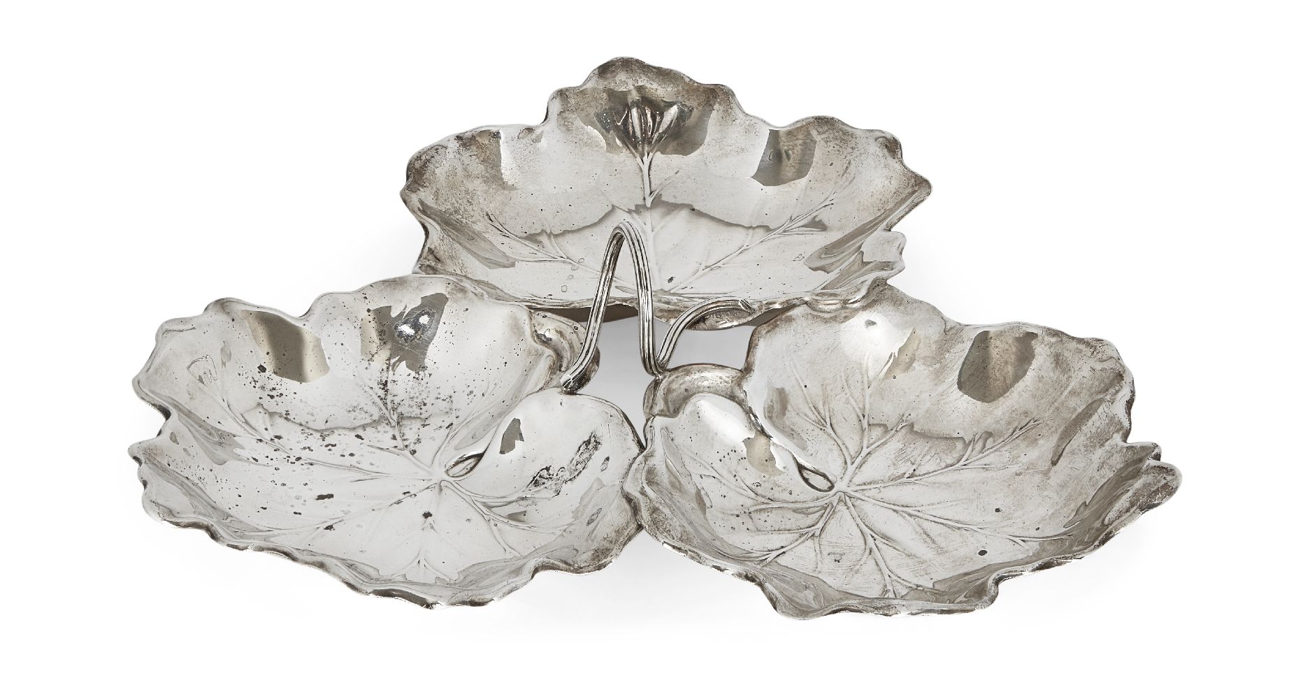 A silver triple leaf dish by Reed & Barton, designed with three leaf-shaped bowls to a loop handle