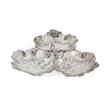 A silver triple leaf dish by Reed & Barton, designed with three leaf-shaped bowls to a loop handle