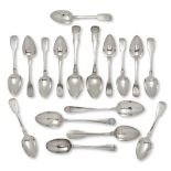 Twelve 19th century silver fiddle pattern dessert spoons, comprising a set of six William IV spoons,