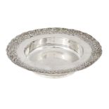 A Tiffany & Co. silver dish with daisy chain rim, of circular form, the flat edge with decorated