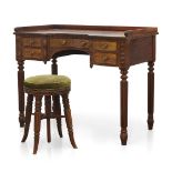 A Victorian mahogany dressing table, the rectangular top with three quarter gallery above five