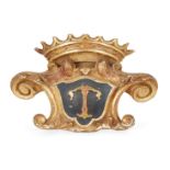 An Italian or French giltwood cresting, 19th century, carved as crown above a shield centered by a