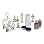 An assortment of silver cruets comprising: two miniature baluster-shaped casters, one London, c.