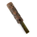 Property of a Gentleman A Maori wood and nephrite hand tool, early 20th century, with carved wood