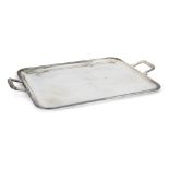 A large silver plated tray, by Christofle, of rectangular form with beaded edge and angular