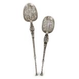 Two Edwardian silver replica anointing spoons, one London, c.1902, Edward Barnard & Sons, the second