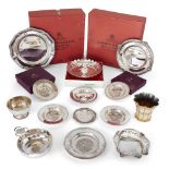 A group of silver comprising: two boxed silver plates, by Garrard & Co., Sheffield, c.1964 and 1972;