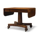 A Regency mahogany sofa table in the manner of Gillows, the rounded rectangular top above single