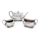 A George V three-piece silver tea set, Sheffield, c.1917 and 1918, Atkin Brothers, of rectangular