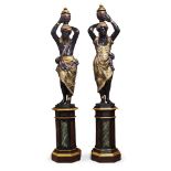 A pair of Venetian giltwood and polychrome decorated blackamoors, 20th century, modelled as a male