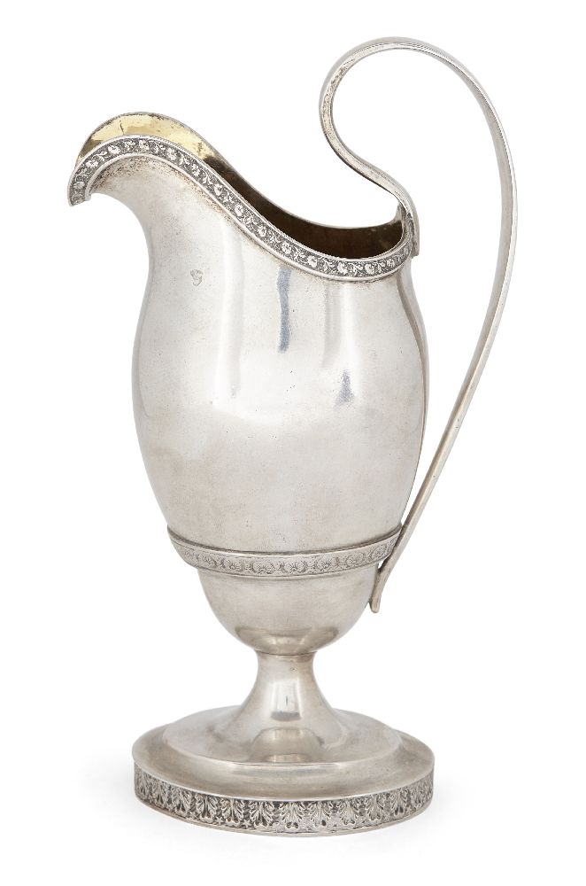 A 19th century German helmet-shaped ewer, stamped only with 12 loth mark for silver and maker's mark