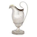 A 19th century German helmet-shaped ewer, stamped only with 12 loth mark for silver and maker's mark