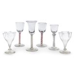 Six drinking glasses, 18th / 19th century, including a wine glass with bell shaped bowl on a