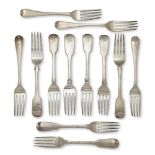 A harlequin set of six Georgian silver monogrammed table forks, of fiddle pattern design with