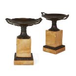 A pair of Louis Philippe bronze and Siena marble tazze, c.1830, each shallow dish with entwined