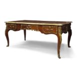 A Louis XV style kingwood and gilt metal mounted bureau plat, mid 20th century, the shaped top inset