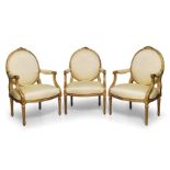 A set of three Louis XVI style giltwood fauteuils, second half 20th century, the oval backrests