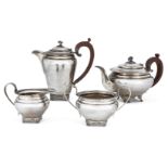 A four-piece silver tea set by Garrard & Co., Birmingham, c.1964, comprising tea pot, coffee pot,