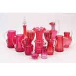 Fourteen pieces of Victorian and later cranberry glass, to include two goblets with gold