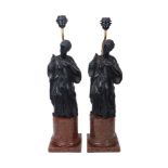 A pair of modern bronzed resin figural lamps, each modelled as a Classical figure on faux porphyry
