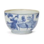 A Chinese porcelain bowl, Wanli period, painted in underglaze blue with a scholar seated in his