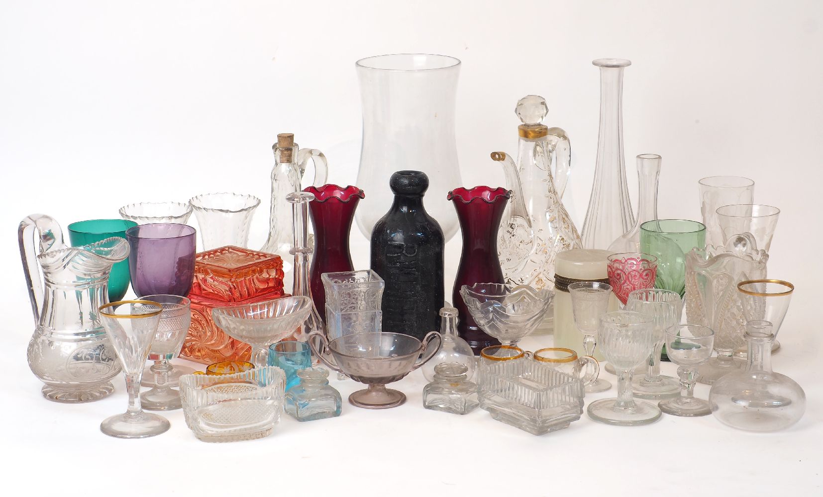 A large assorted group of glassware, 19th/20th century, to include: cranberry, green and various