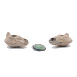 Two Roman style pottery oil lamps, 20th Century, 7cm and 8.5cm long, together with a turquoise glass